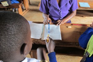 Children practicing writing during individual work time