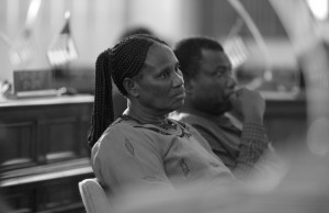 A couple listens during a 2005 meeting of African immigrants with Marina Dimitrijevic, a member of Milwaukee County Board of Supervisors. Courtesy of the office of Marina Dimitrijevic. Reprinted under Creative Commons.