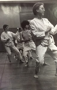 McEldowney (center, in tank top) in a martial arts or self-defense class.
