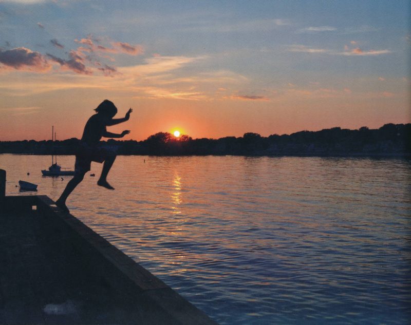 This is a rite of passage growing up here in Nahant--jumping off the wharf! My son relishes in every summer moment. Pictured: Casey DeCamp. Location: Town Wharf