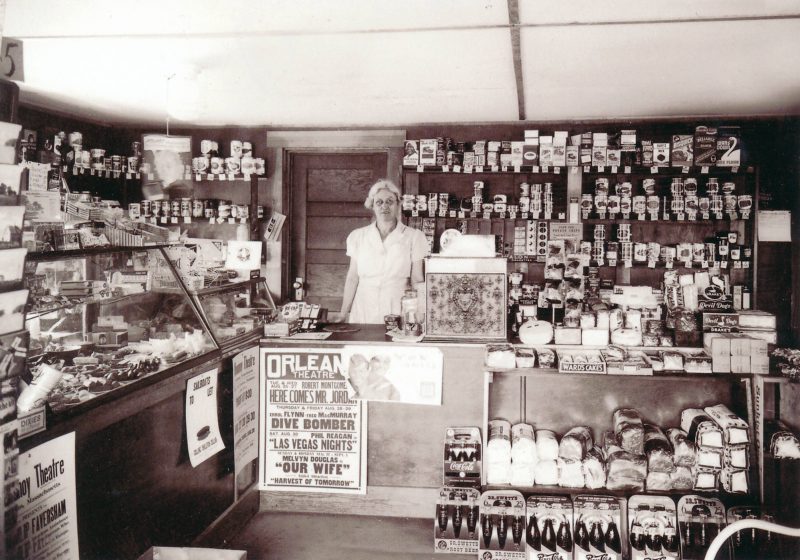 Nellie is staffing her general store on Route 6 in North Eastham. The theater posters are for Orleans Theater movies showing is September and August. Pictured: my grandmother Nellie Nickerson.