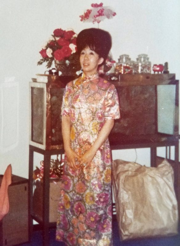 Modern take on traditional Chinese dress Description 'Mary is wearing a traditional Chinese dress, 'cheongsam', that has been modernized to the 1970s. Pictured: my grandmother Mary Soo Hoo.'
