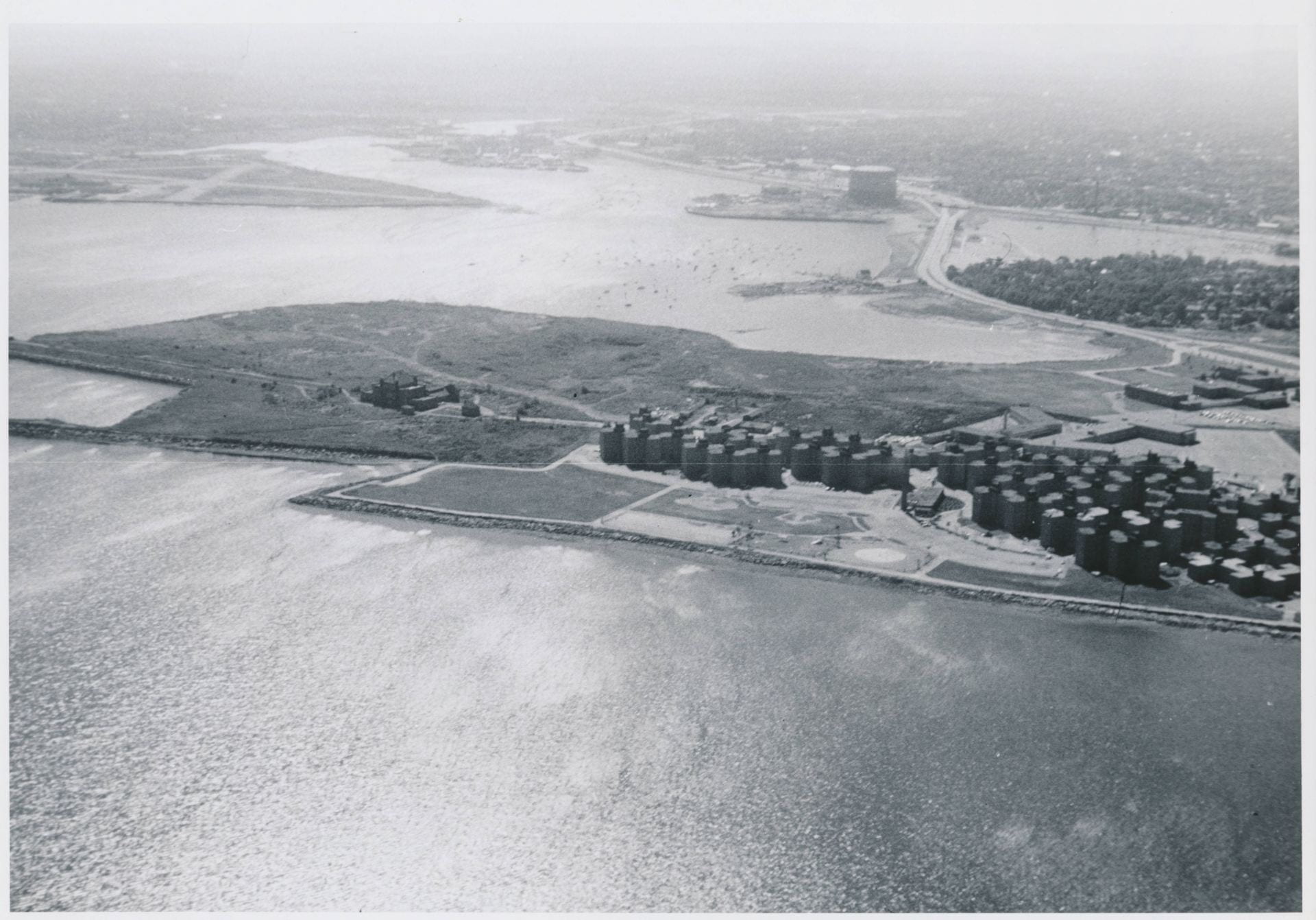 Black-and-white aerial photograph of the Columbia Point peninsula