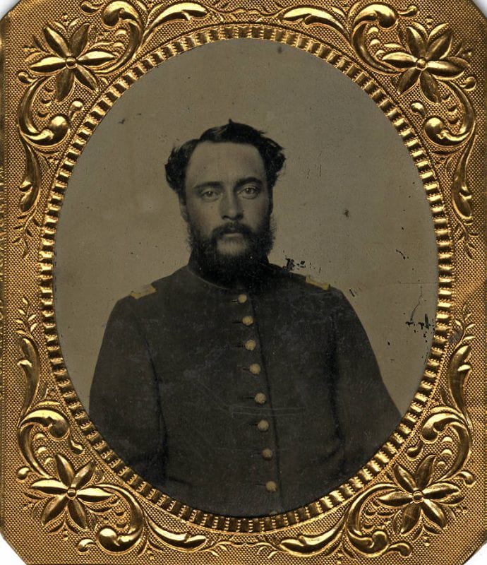 Daguerreotype portrait in a gold frame of William Cowles in uniform from the waist up