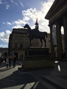 The statue with the traffic cone on his head!