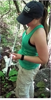 Carolyn shows off a recovered soil sample