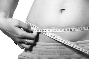 image of measuring your waist line