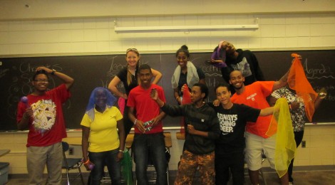 Students and Teacher posing together in their improv class.