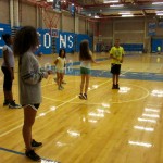 Camp Shriver kids have an option to play indoor such as basketball or jump rope! Which this girl is impresses by her friends and the staff of her skills of jump rope.
