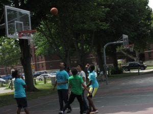 students playing basketball.